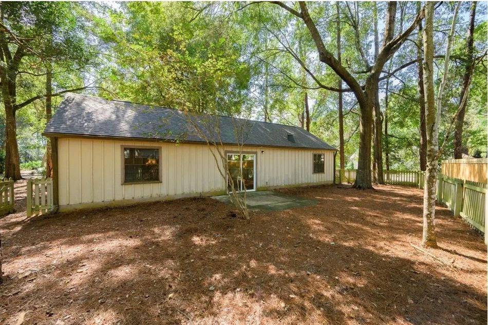 L-Shaped Ranch Among Mature Trees, interior or exterior detail view