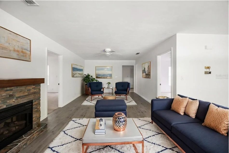Gray Home with Renovated Kitchen and Stacked-Stone Fireplace, interior or exterior detail view