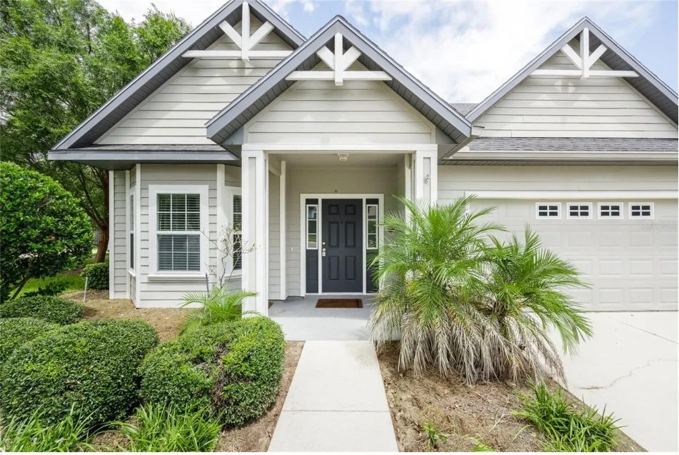 Gray Craftsman with Triple-Gable Roofline in Gainesville, Florida